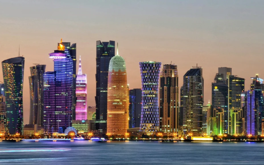 Top real estate companies in Qatar with Doha skyline highlighting leading property agencies and real estate market