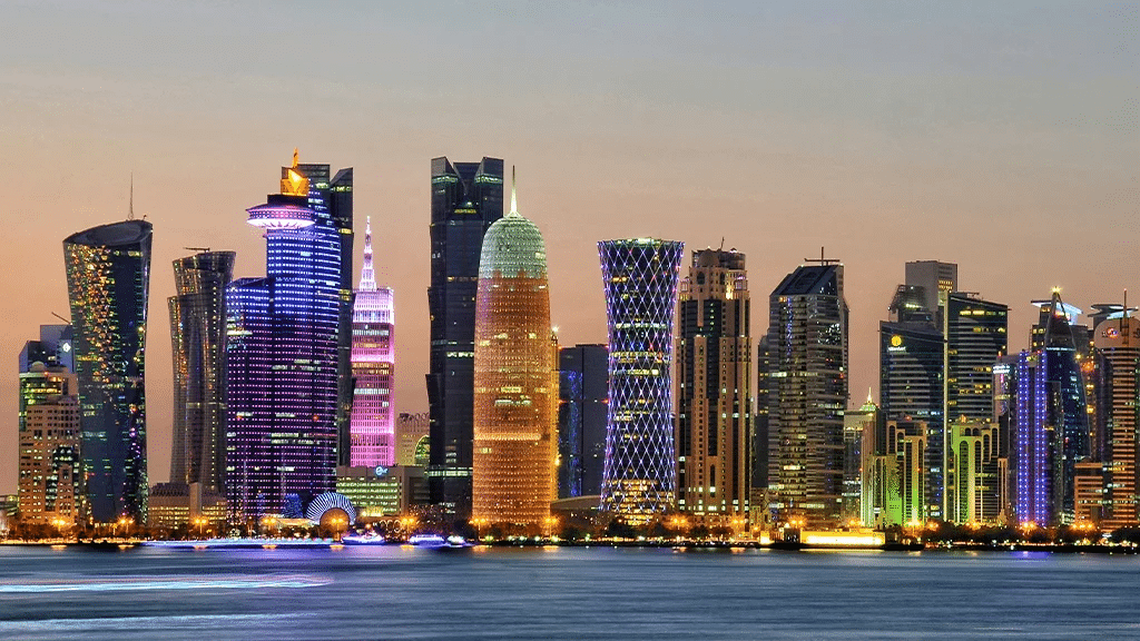 Top real estate companies in Qatar with Doha skyline highlighting leading property agencies and real estate market